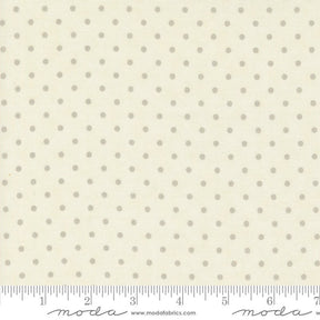 a ruler with a white polka dot pattern on it