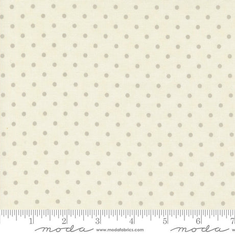 a ruler with a white polka dot pattern on it