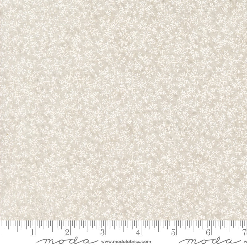 a ruler with a white flower pattern on it
