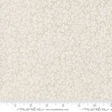 a ruler with a white flower pattern on it