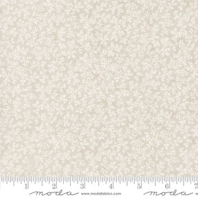 a ruler with a white flower pattern on it