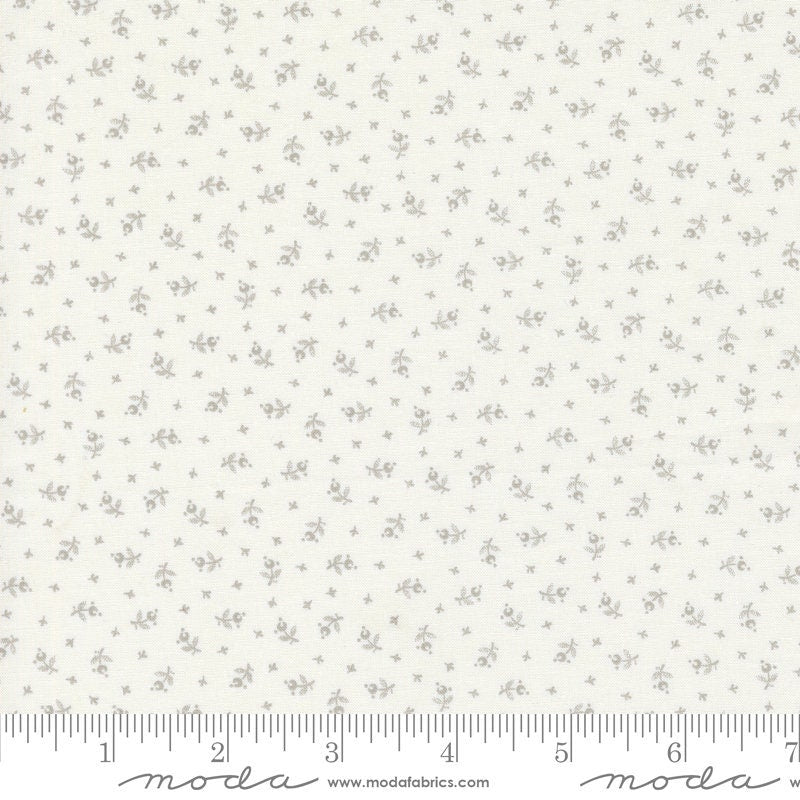 a ruler with a white flower pattern on it