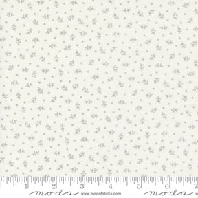 a ruler with a white flower pattern on it