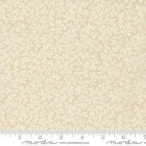 a ruler with a white flower pattern on it