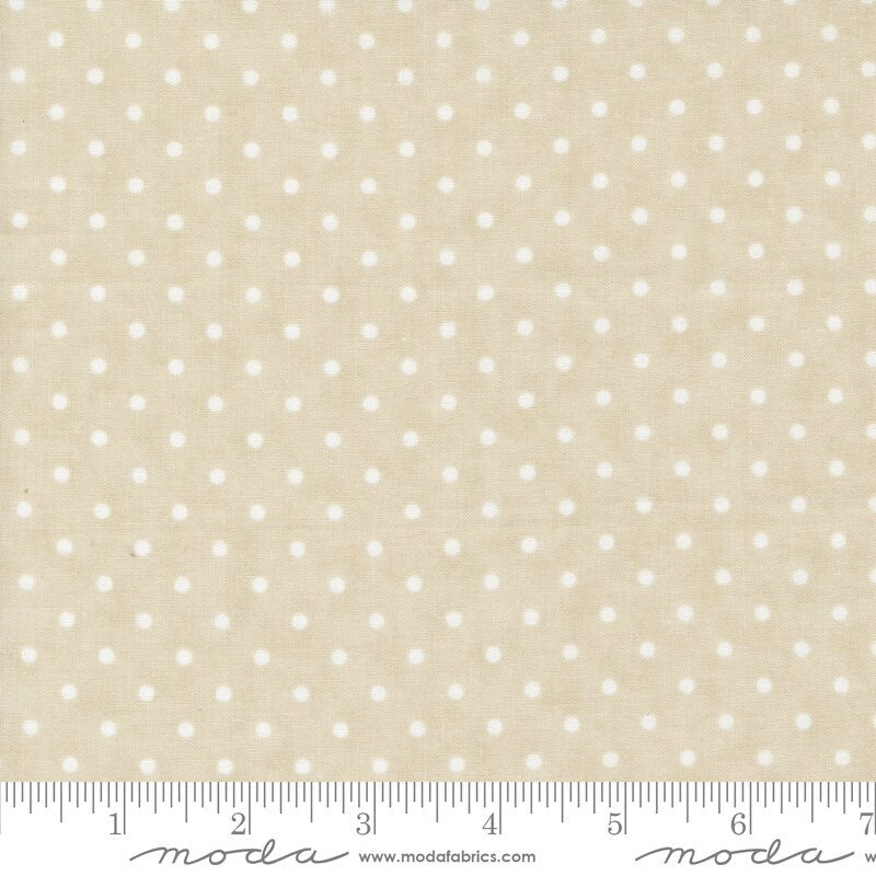 a ruler with a white polka dot pattern on it