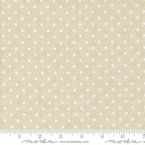 a ruler with a white polka dot pattern on it