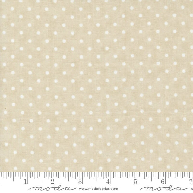 a ruler with a white polka dot pattern on it