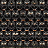 a black and orange owl pattern on a black background