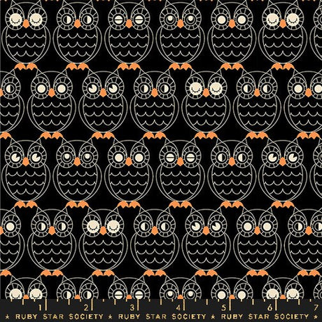 a black and orange owl pattern on a black background