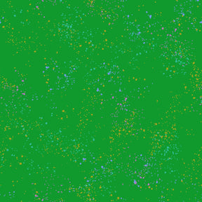 a green background with a lot of small speckles