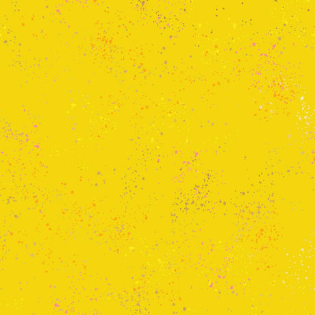 a yellow background with lots of small dots