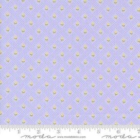 a ruler with a purple background and gold dots