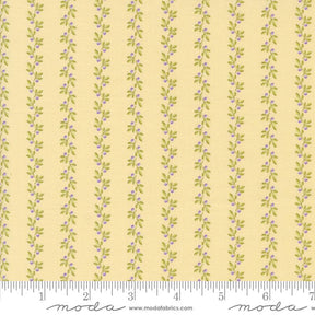 a ruler with a yellow background and a flower pattern