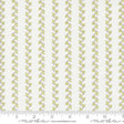 a white and green striped fabric with leaves on it