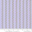 a purple and green striped fabric with leaves on it