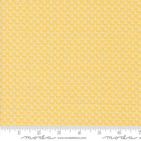 a ruler with a yellow and white pattern on it