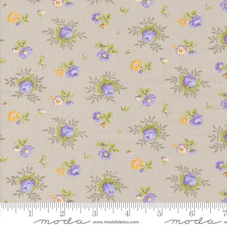 a flowered fabric with blue and yellow flowers on it