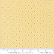 a yellow background with small white dots