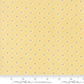 a yellow background with small white dots