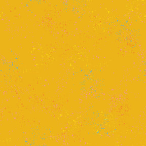a yellow background with small speckles