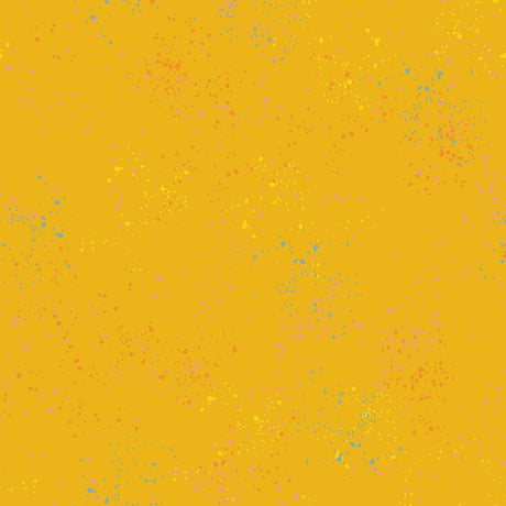 a yellow background with small speckles