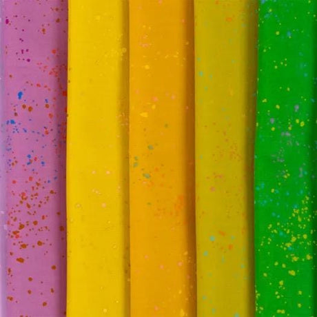 a close up of a row of different colored papers