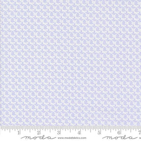 a ruler with a blue and white pattern on it