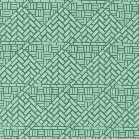 a green background with a pattern of intersecting lines