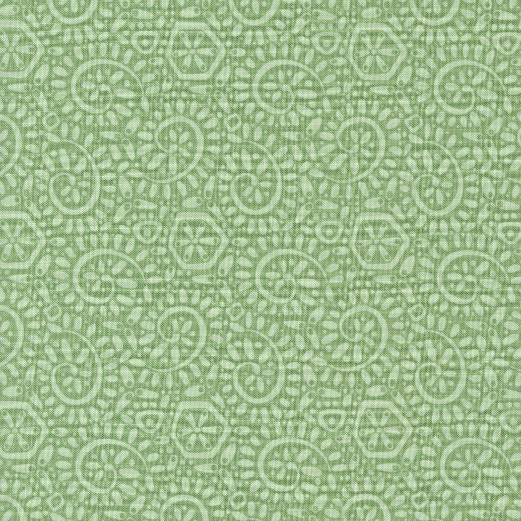 a green and white background with a pattern