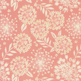 a pink background with white flowers and leaves