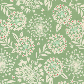 a green background with white and red flowers