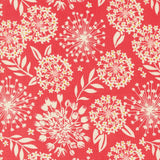a red background with white flowers and leaves