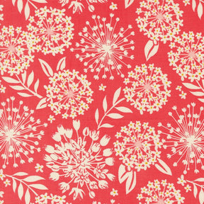 a red background with white flowers and leaves