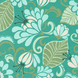 a blue and green floral pattern with leaves