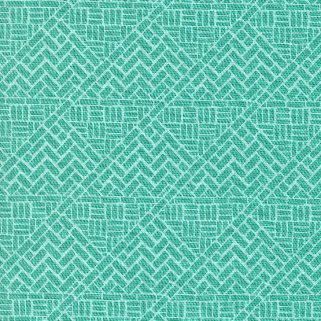 a green and white background with a pattern