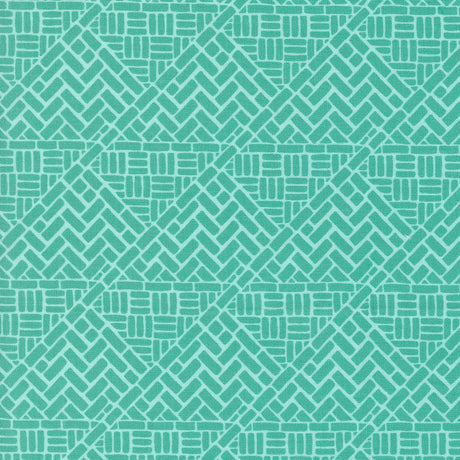 a green and white background with a pattern