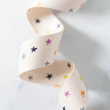 Starry Webbing Natural in Magic 1 1/2" wide sold by the yard.