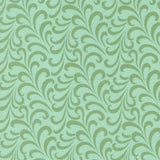 a green and white wallpaper with swirls on it