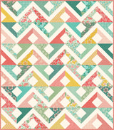 a colorful quilt with many different patterns on it