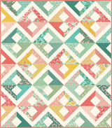 a colorful quilt with many different patterns on it