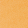 a yellow background with white spots on it