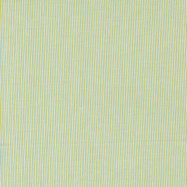 a close up of a green and white striped fabric