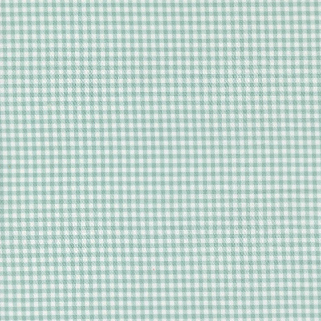 a blue and white checkered paper with a white background