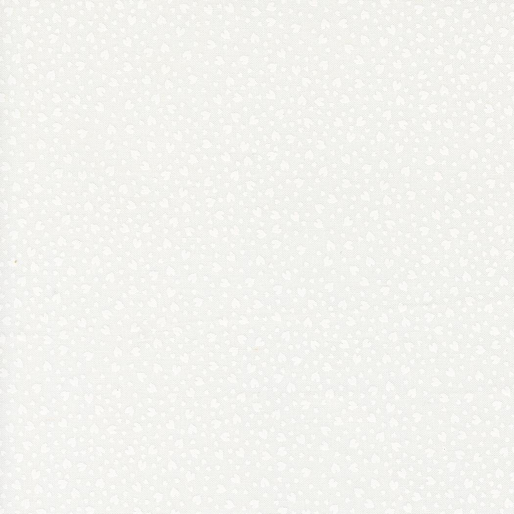a black and white photo of a white wall