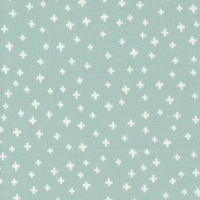 a light blue background with white crosses on it