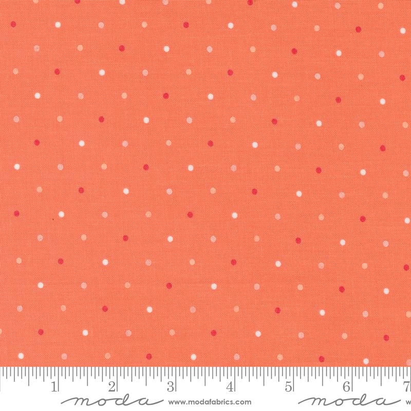 a ruler with a red and white polka dot pattern on it
