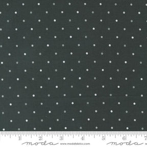 a black background with white polka dots