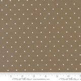 a brown and white polka dot fabric