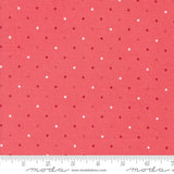 a red background with white polka dots