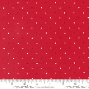 a red background with white polka dots